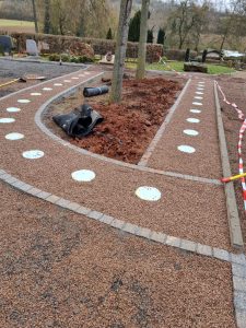 Fertigstellung Einbau Urnenerdgrabsysteme_Friedhofbau Plus GmbH